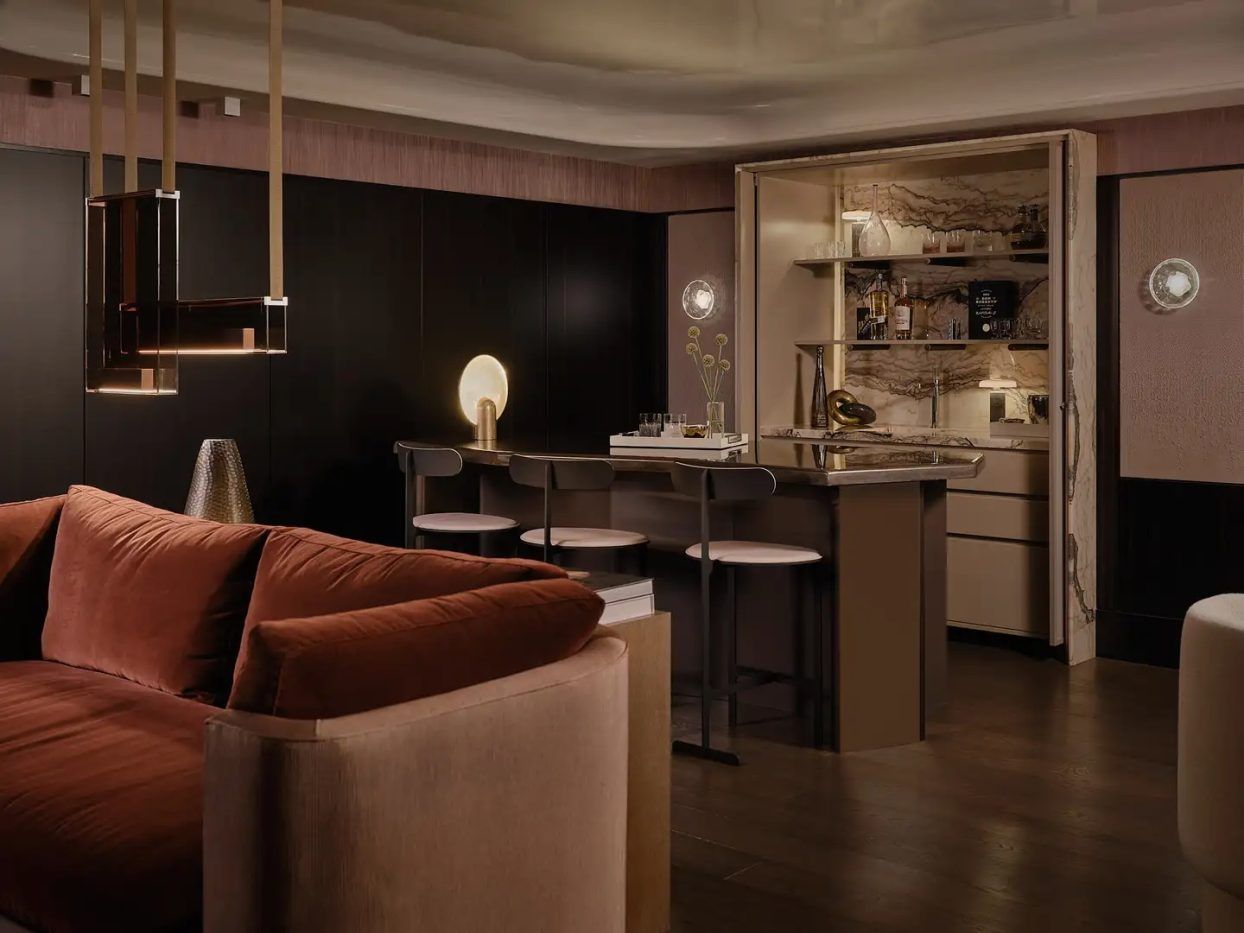 EM Design Studio, conceived a sleek, tucked-away bar, dubbed The Speakeasy, for homeowners in Toronto