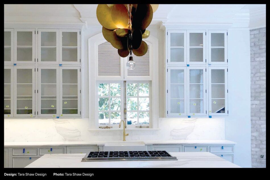 Ambient lighting plays an important role in this kitchen by Tara Shaw Design