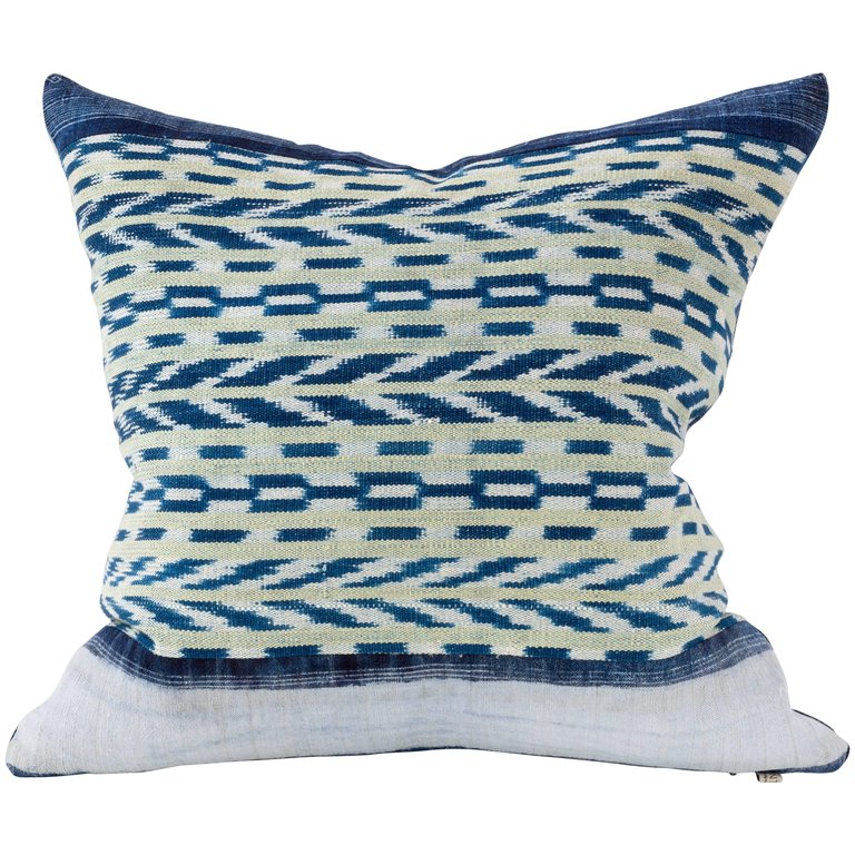blue patterned throw pillow