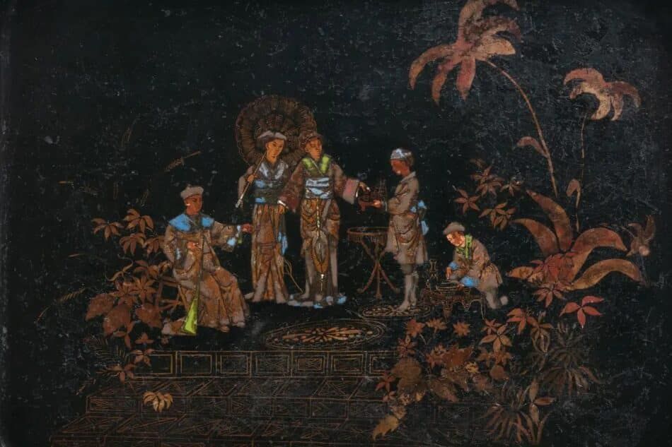 black lacquer and papier-mâché tray features Asian figures and botanicals