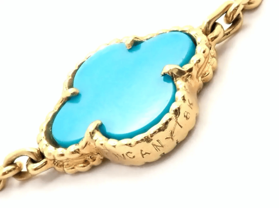 Detail of the turquoise 20 motif Van Cleef & Arpels Alhambra necklace