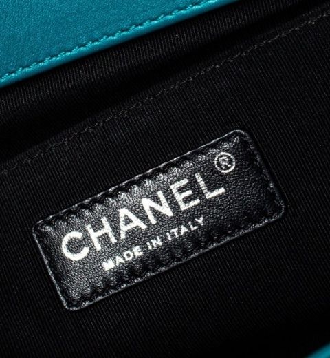A stamp on a Chanel turquoise patent-leather medium Plexiglas Boy bag, 2010