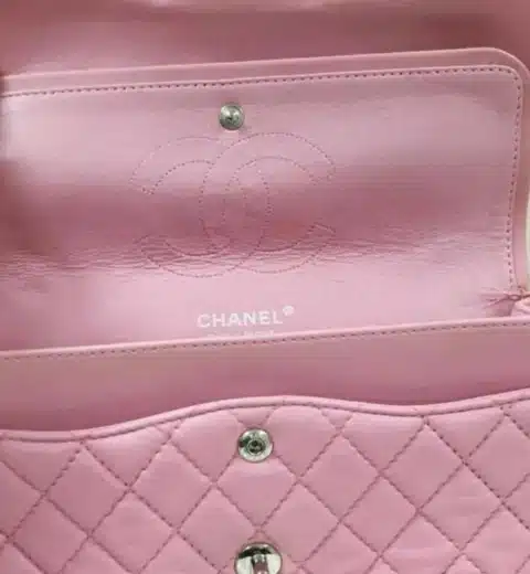 A stamp on a Chanel vintage pink Caviar double flap bag