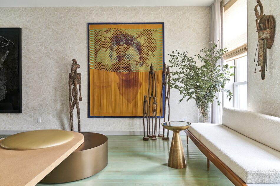Malene Djenaba Barnett's Brooklyn living room, designed by Leyden Lewis, features West African art and contemporary furniture.