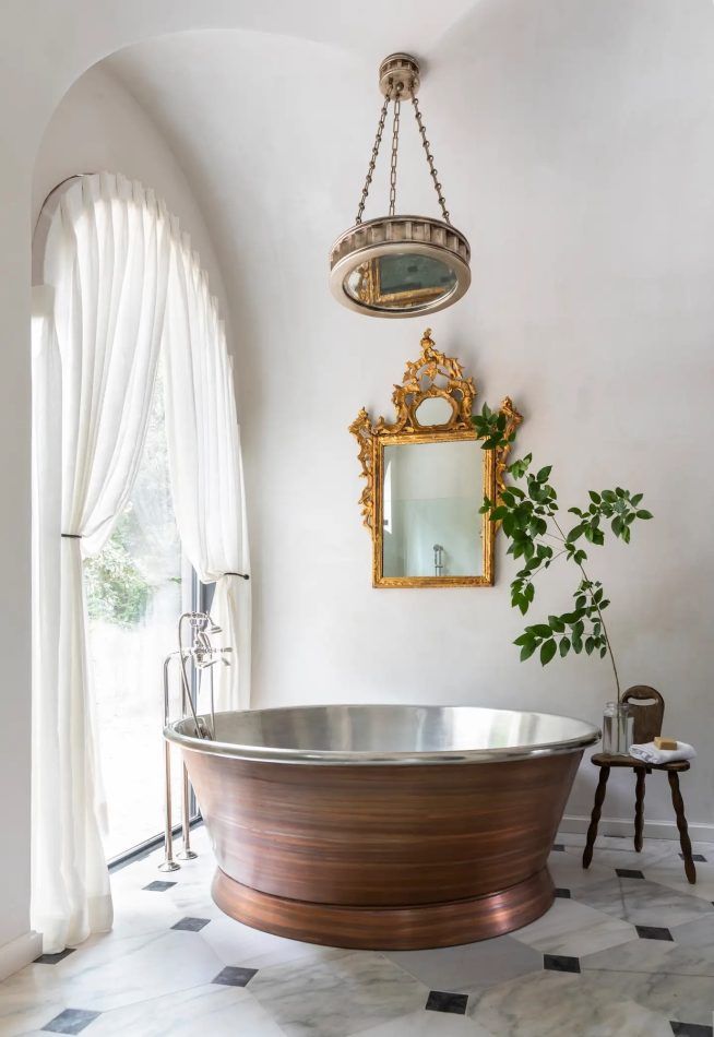 Marie Flanigan suffused this Houston bathroom with Provençal character.