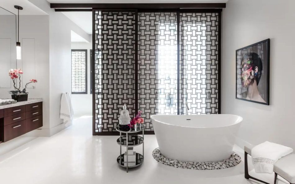 This Ft Lauderdale bath “is a modern take on a Moroccan riad,” says designer Tom Stringer