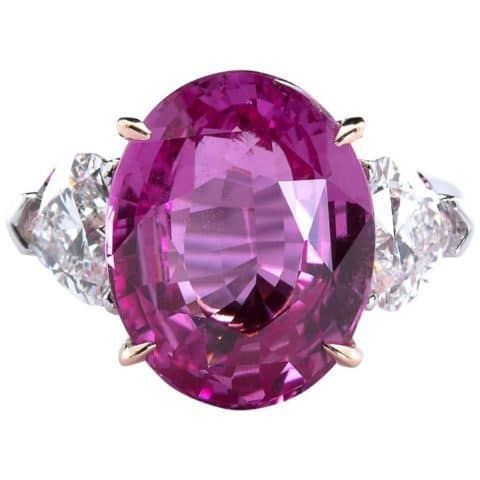 A 9.5-carat step-cut pink fancy sapphire ring. Offered by TMW Jewels. 