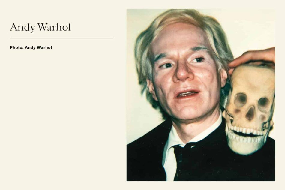 Portrait of Pop Artist Andy Warhol with skull on his shoulder