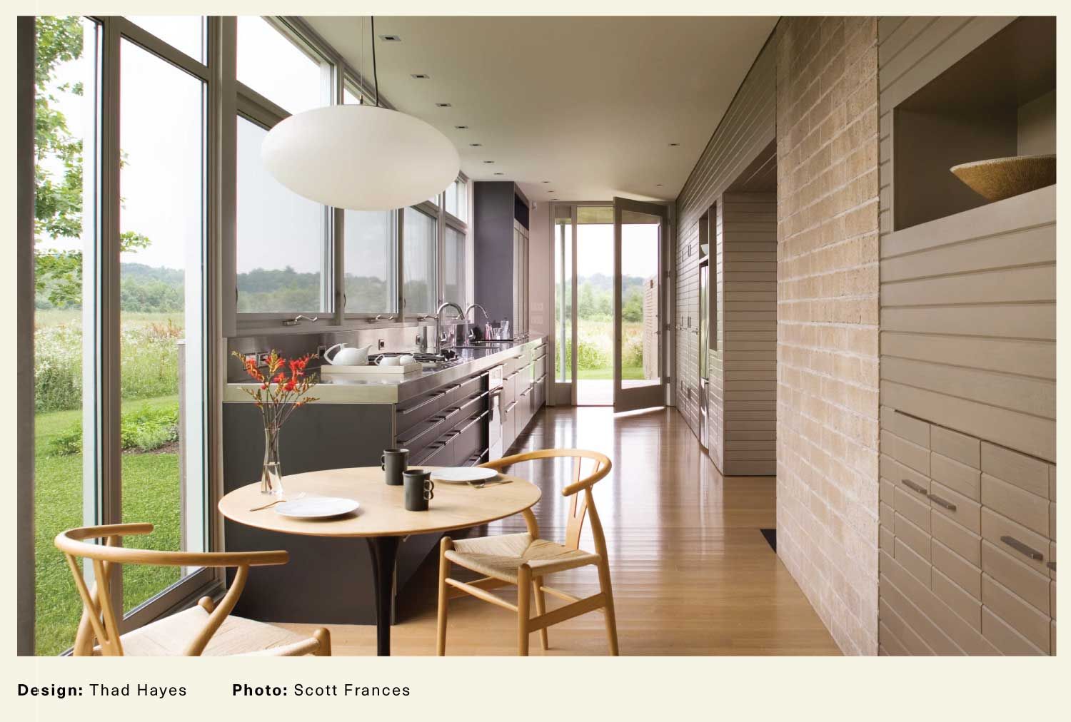 Modern kitchen with a door opening out into the yard