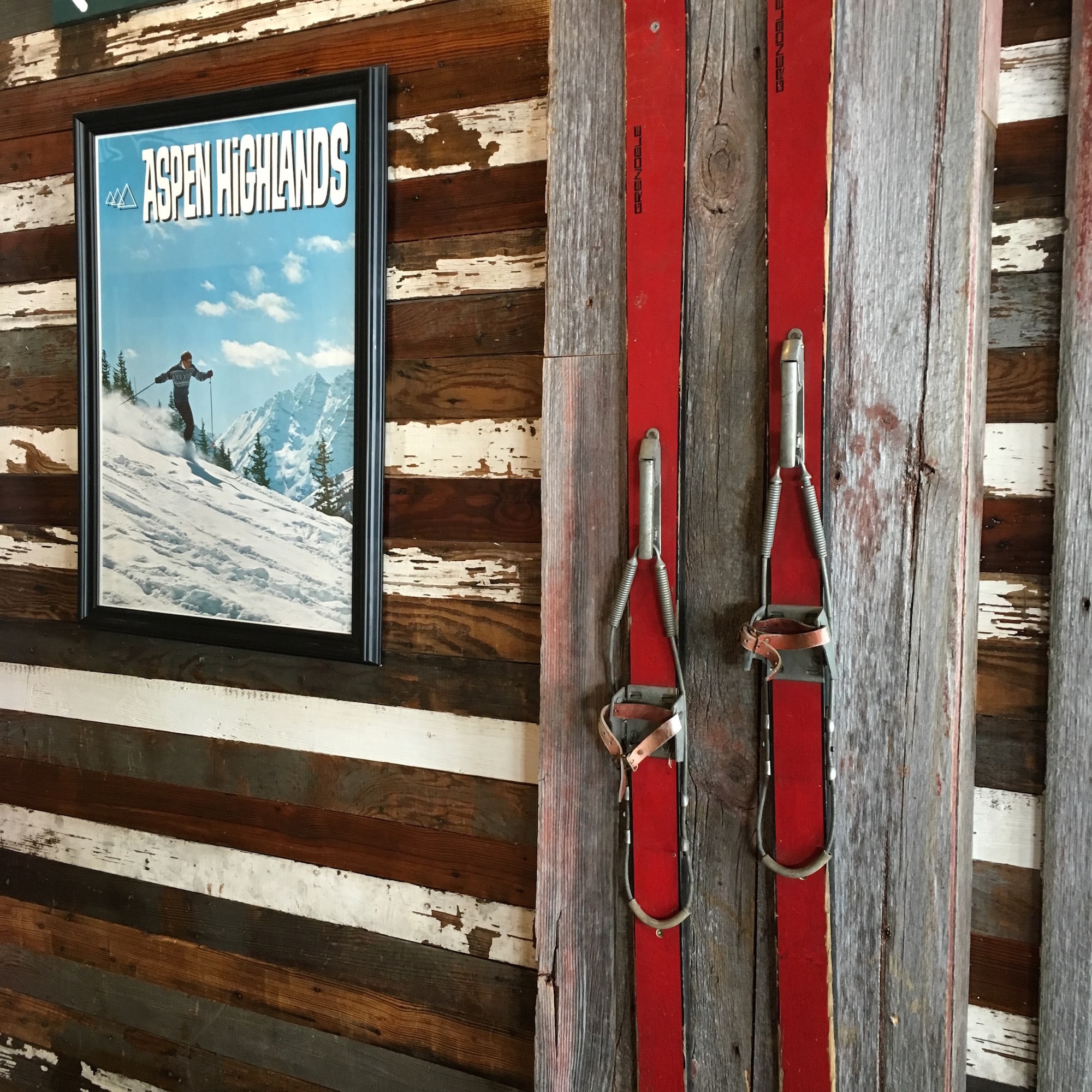 Vintage skis and framed poster Aerin Lauder's Aspen home