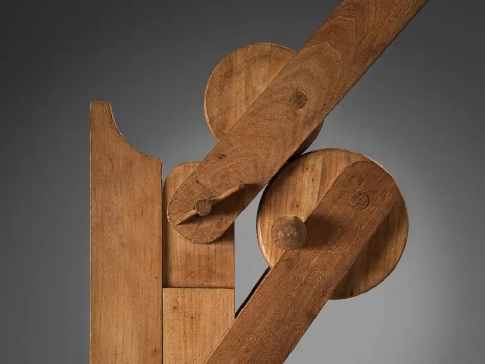 Close-up of the gears and joinery in the central articulation of the  Pinocchio floor lamp by Pietro Cascella