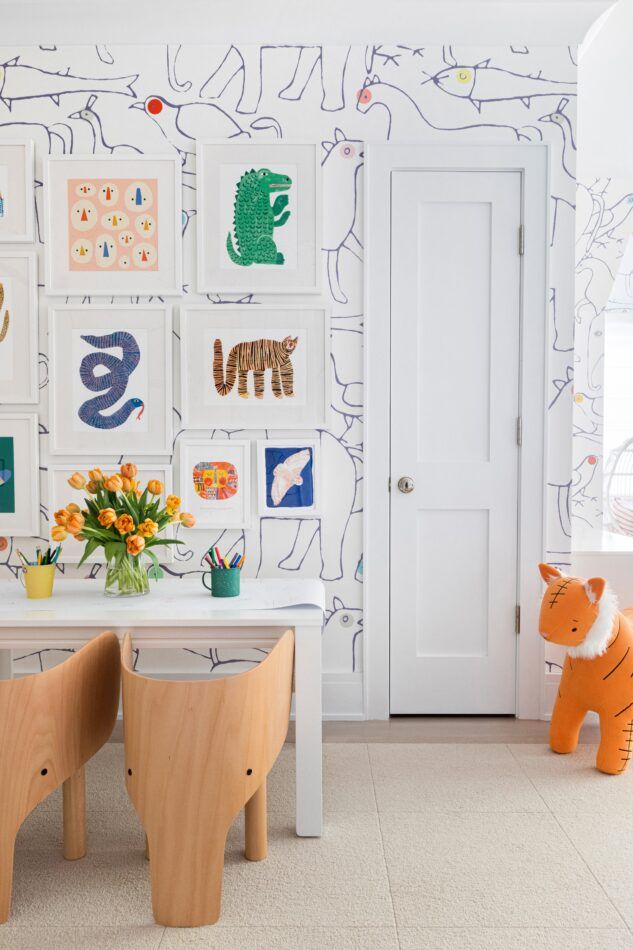 a playroom with white wallpaper