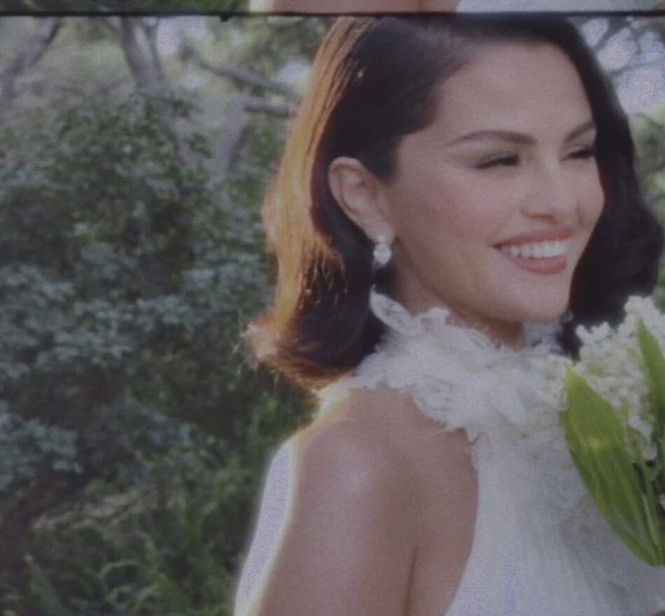 Selena Gomez in a wedding dress holding a bouquet of flowers
