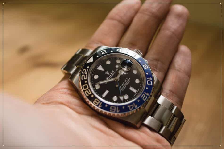 A real Rolex, like this GMT Master, feels heavy in the hand