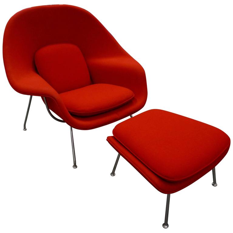 red arm chair and ottoman