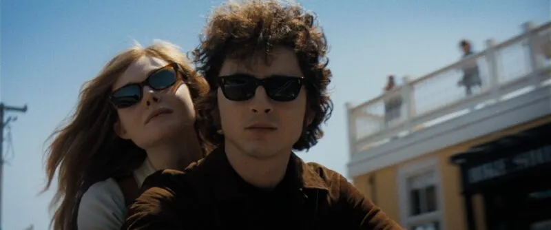 Timothee Chalamet and Elle Fanning in "A Complete Unknown"