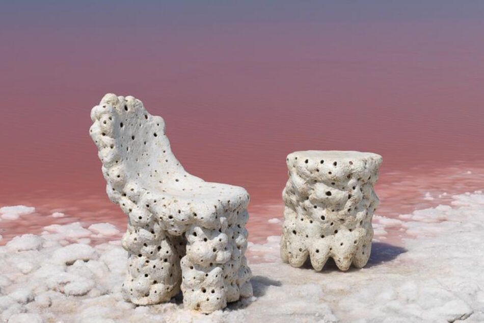 Agnès Debizet's stoneware Bergère chair and Morille side table on the white shore of a pink sea
