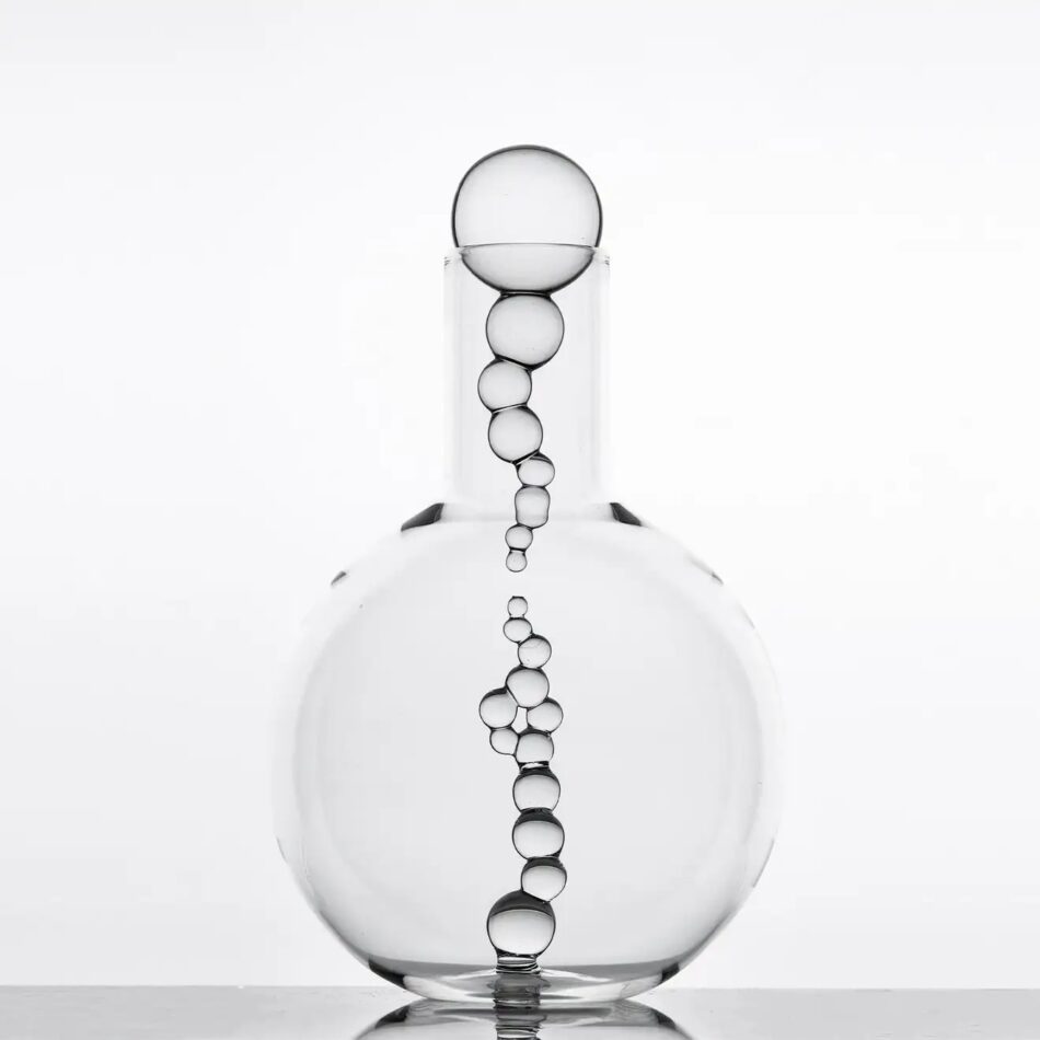 Atelier Crestani's hand-blown Alchemica decanter, made to look as if it has a column of bubbles inside