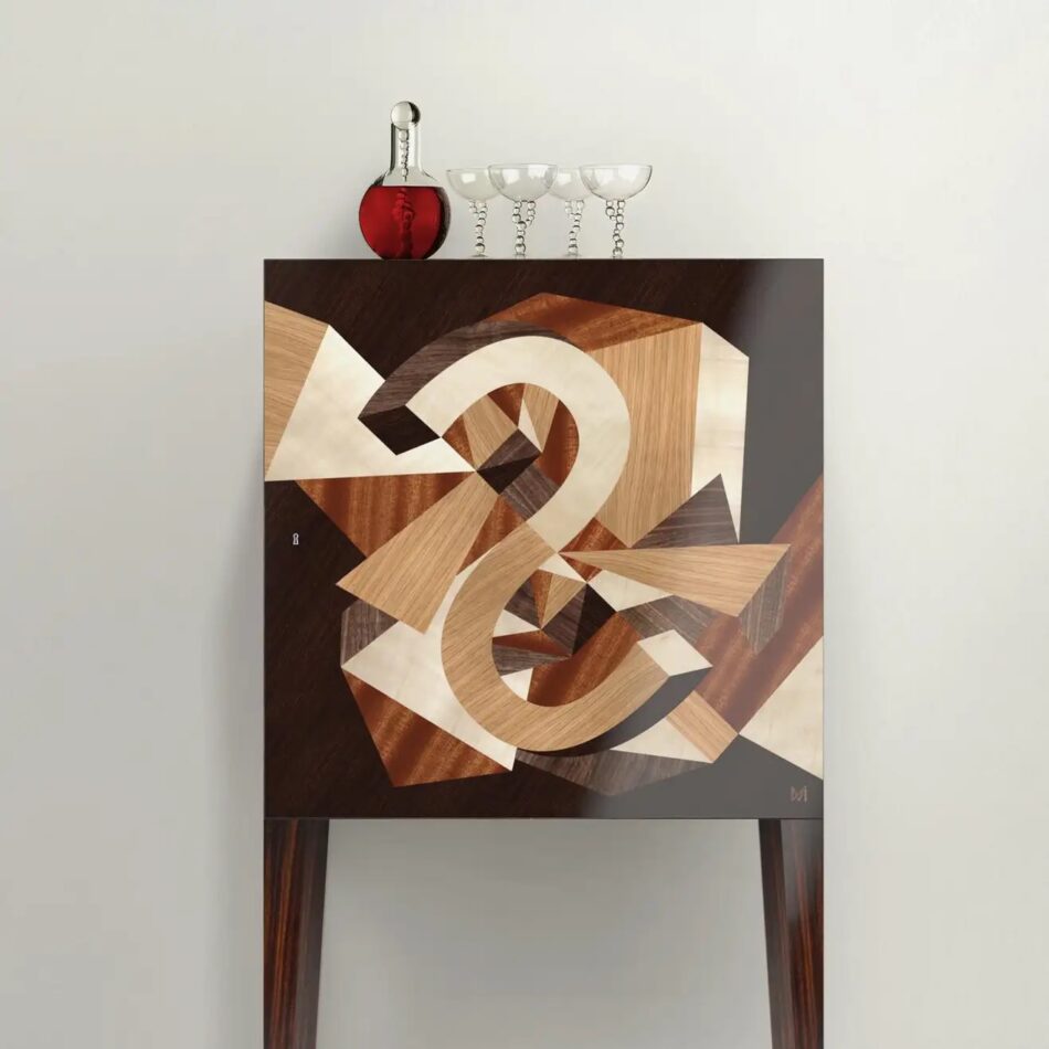 Atelier Crestani's Alchemica decanter and manhattan glasses atop a contemporary marquetry bar cabinet