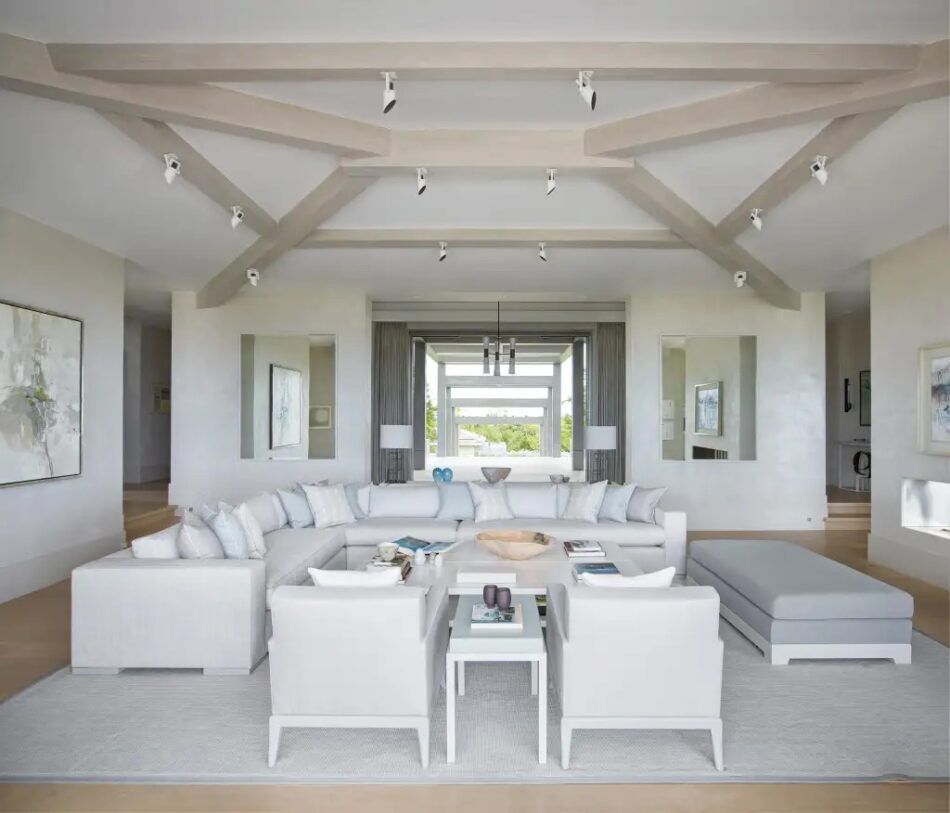 The living room of a beachfront villa in the Bahamas designed by Philippa Thorp.
