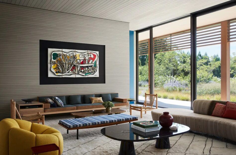 “The vision was to create a relaxed, comfortable home that was still sophisticated and warm,” Neal Beckstedt says of this Hamptons compound. In the modern living room, that eclectic approach is on full display.