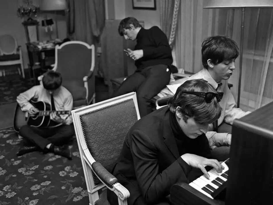 The Beatles Composing in their hotel room in Paris, 1964, by Harry Benson 