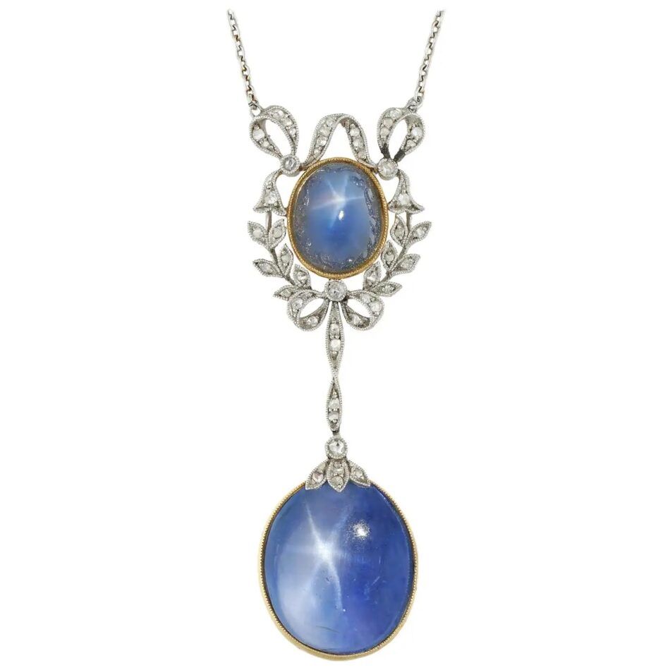 A Belle Époque pendant necklace with two star sapphires