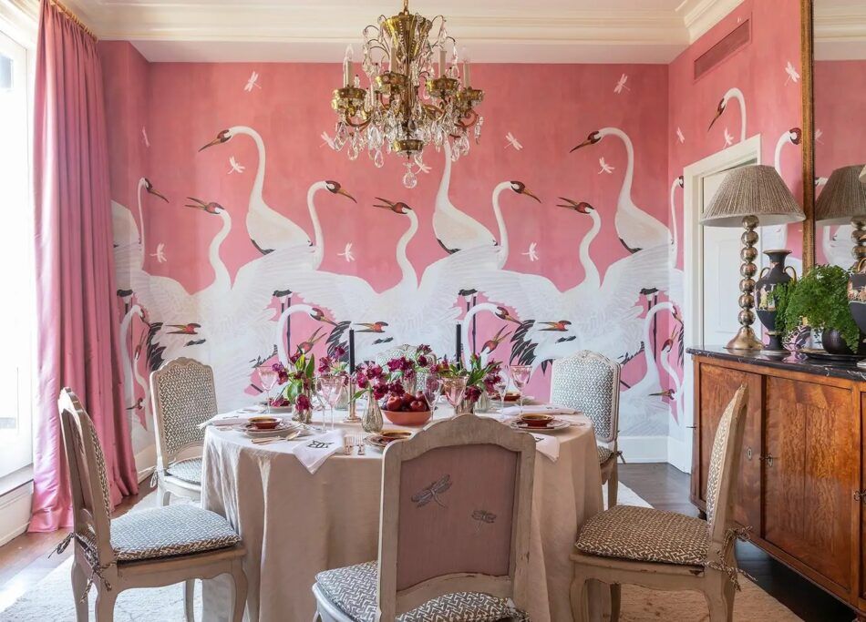 Pink dining room in a terraced penthouse apartment on New York’s Sutton Place designed by Brockschmidt & Coleman
