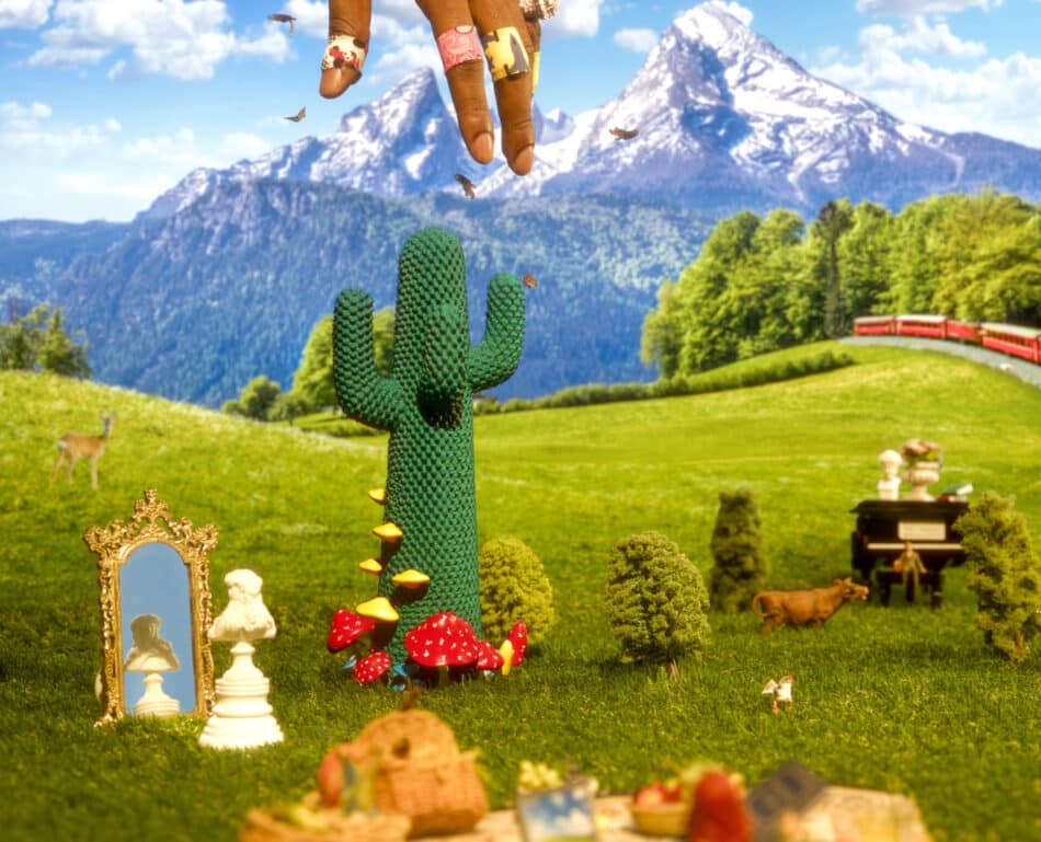 The Guframini Shroom CACTUS in a field surrounded by other miniature figures and furniture