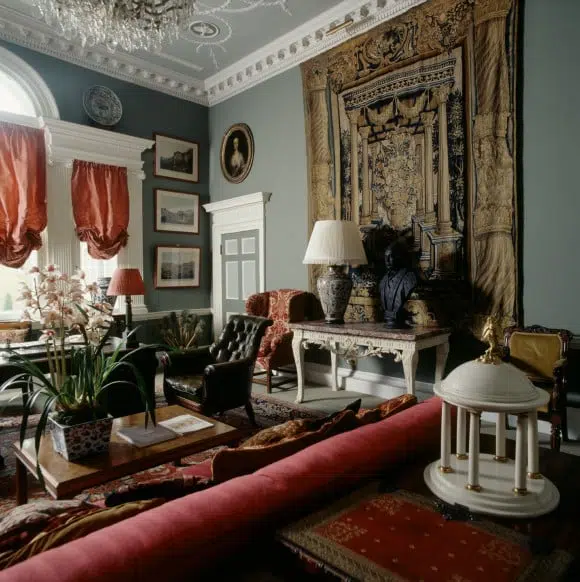 For a Berkeley Square office, designer Christopher Hodsoll used silk Fortuny curtains and a 16th-century Flemish tapestry
