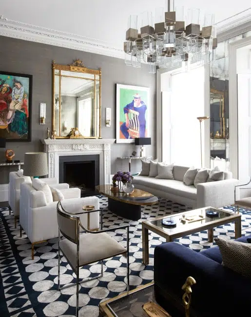Designer Peter Mikic's London home includes a David Hockney print, custom mirror-work and a mid-century French cocktail table