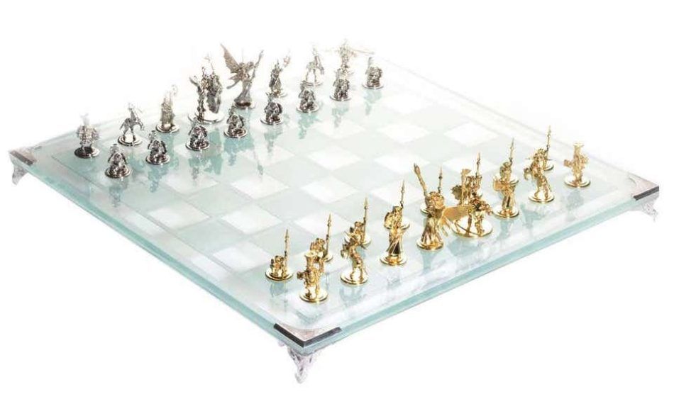 Gold and tempered glass chess set