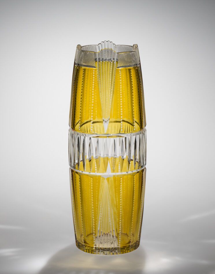 A yellow cut-glass vase in the exhibition "Brilliant Color" at the Corning Museum of Glass