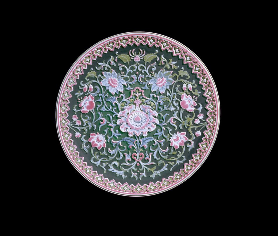 A pink, green and white plate in the exhibition "Brilliant Color" at the Corning Museum of Glass
