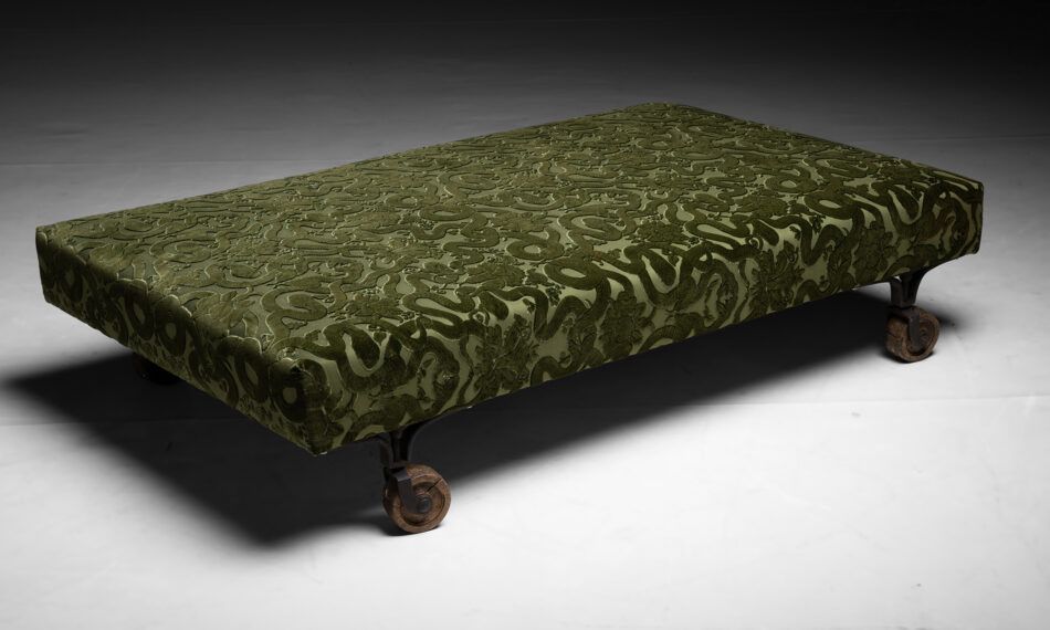An ottoman by Bespoke Footstool Company in England newly upholstered in green velvet with snake pattern by House of Hackney