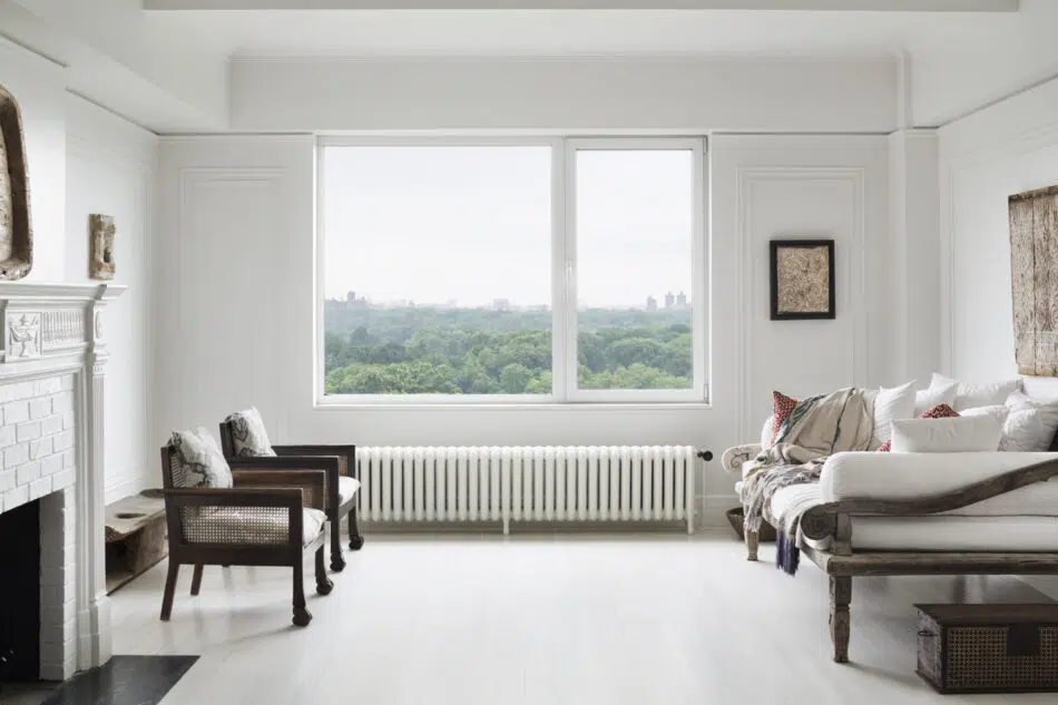 White living room by Andrianna Shamaris in New York