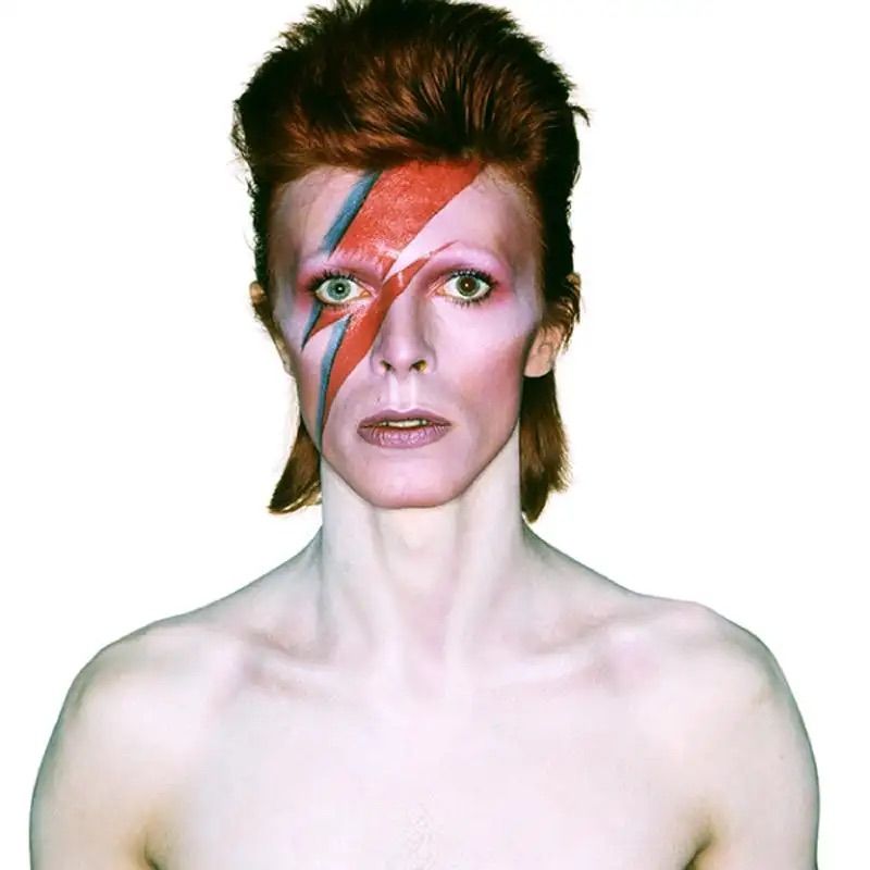 David Bowie with lightning bolt face paint