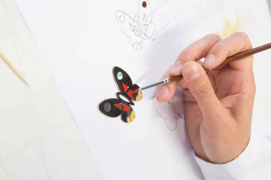 Butterfly pendant being painted