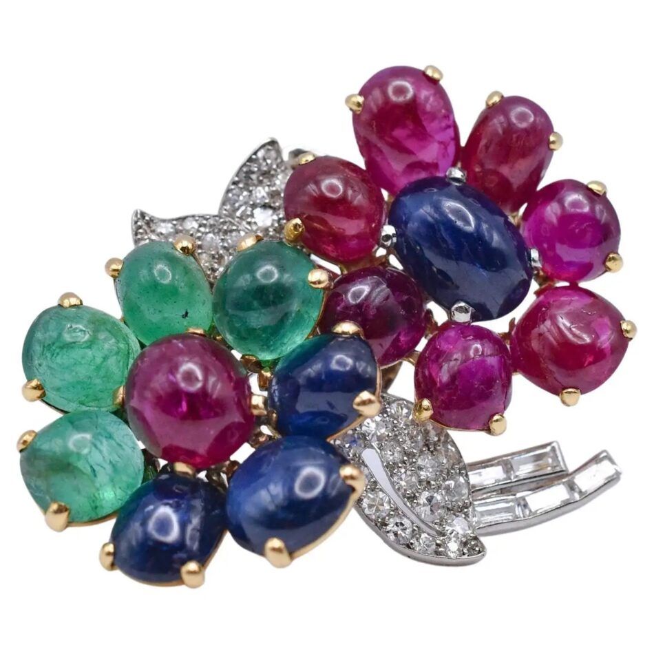 Cartier floral brooch set with cabochon rubies, emeralds and sapphires