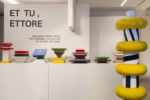 ettore sottsass gallery show with white walls and colorful artworks