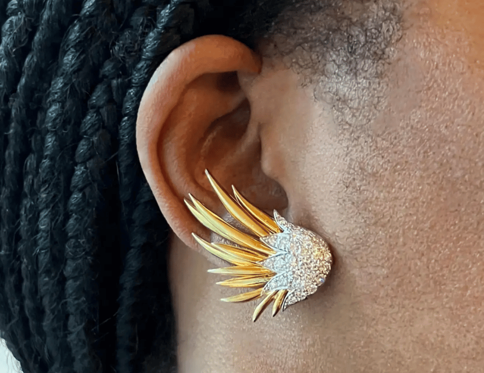 Model wearing Jean Schlumberger Flame ear clips