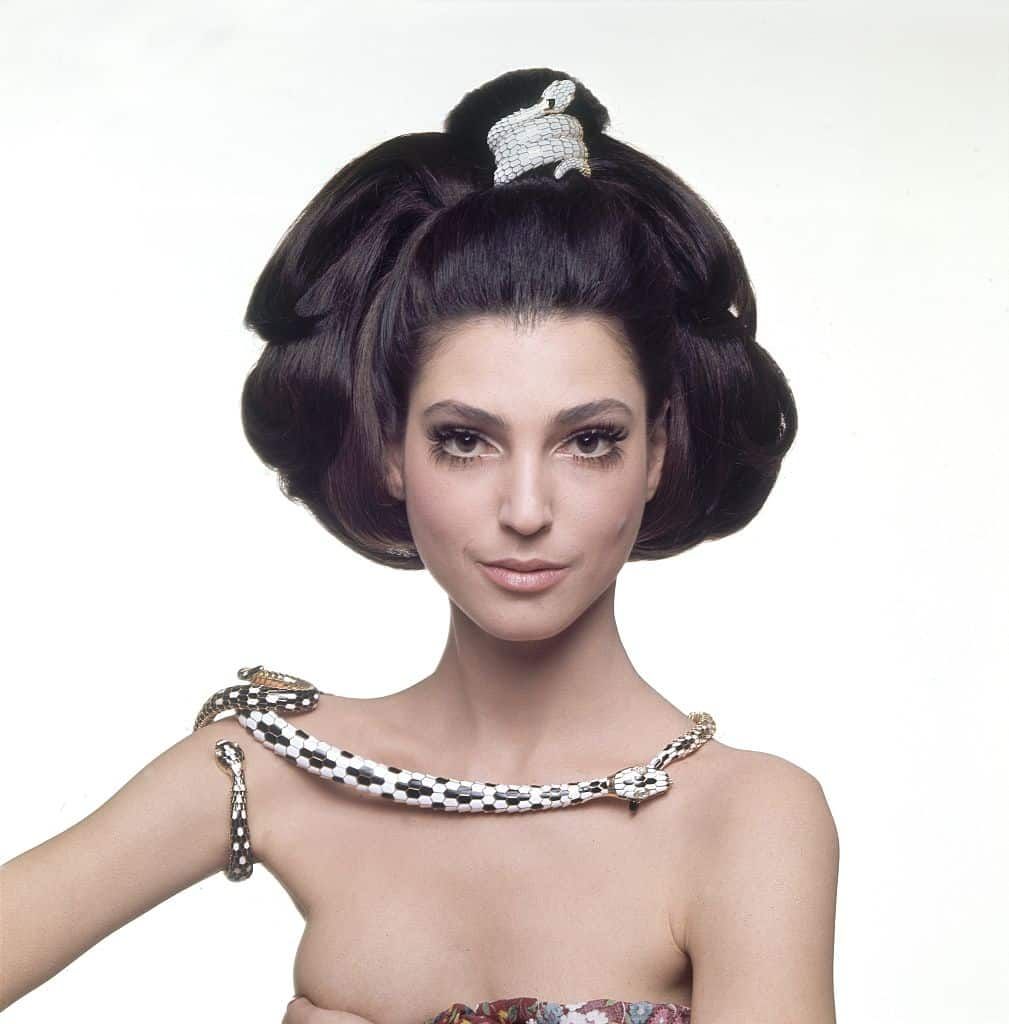 Model Benedetta Barzini wearing an enameled Bulgari Serpenti jewelry