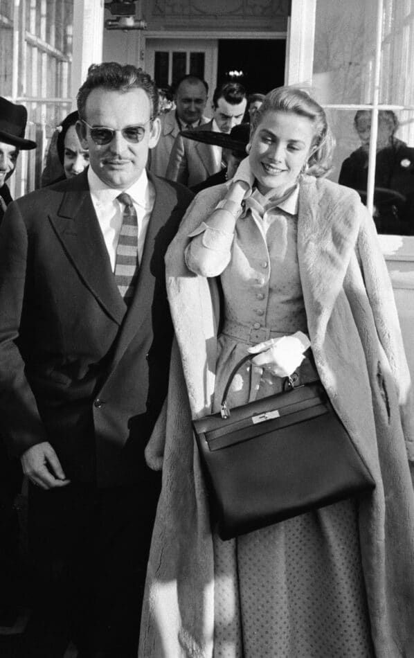 Grace Kelly with a Kelly bag and Prince Rainier