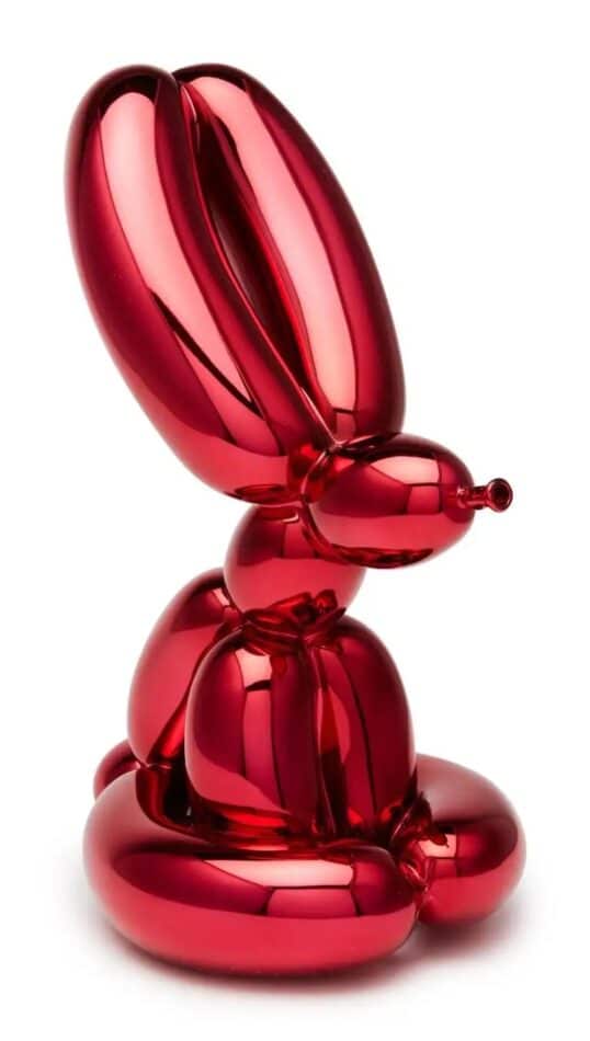 shiny red balloon animal sculpture