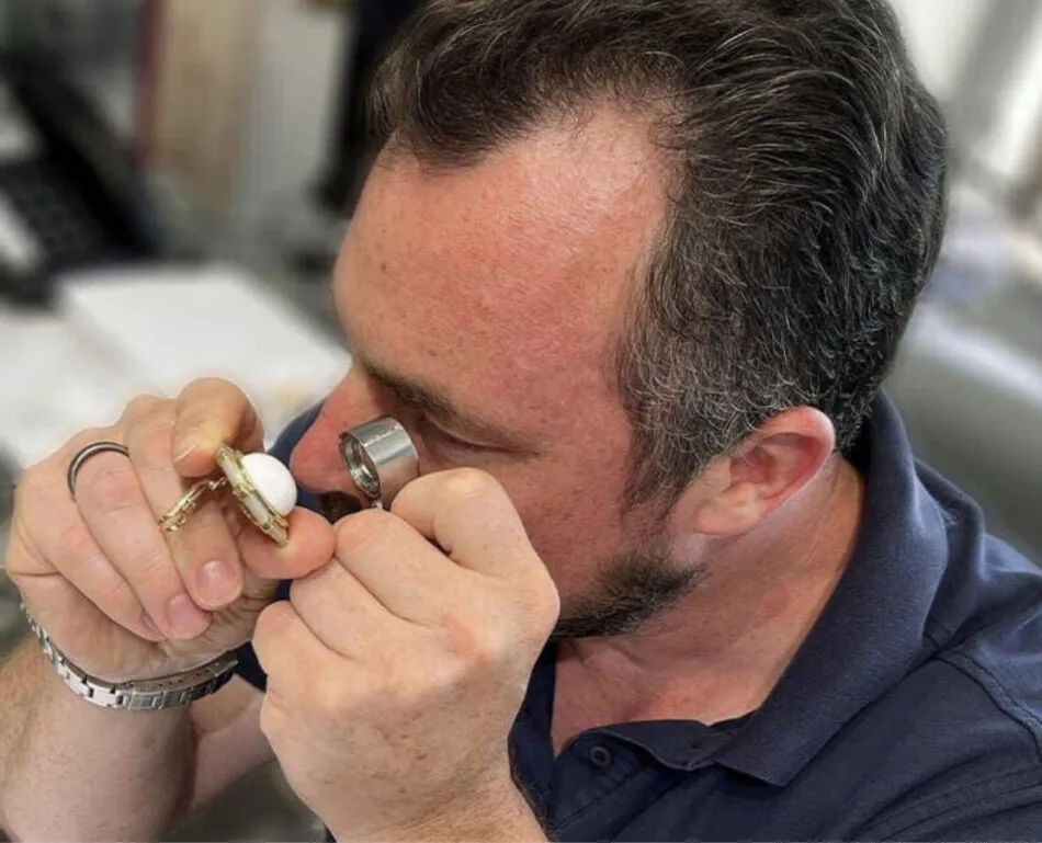 Michael Burns, a certified gemologist and second-generation jeweler at Benchmark of Palm Beach