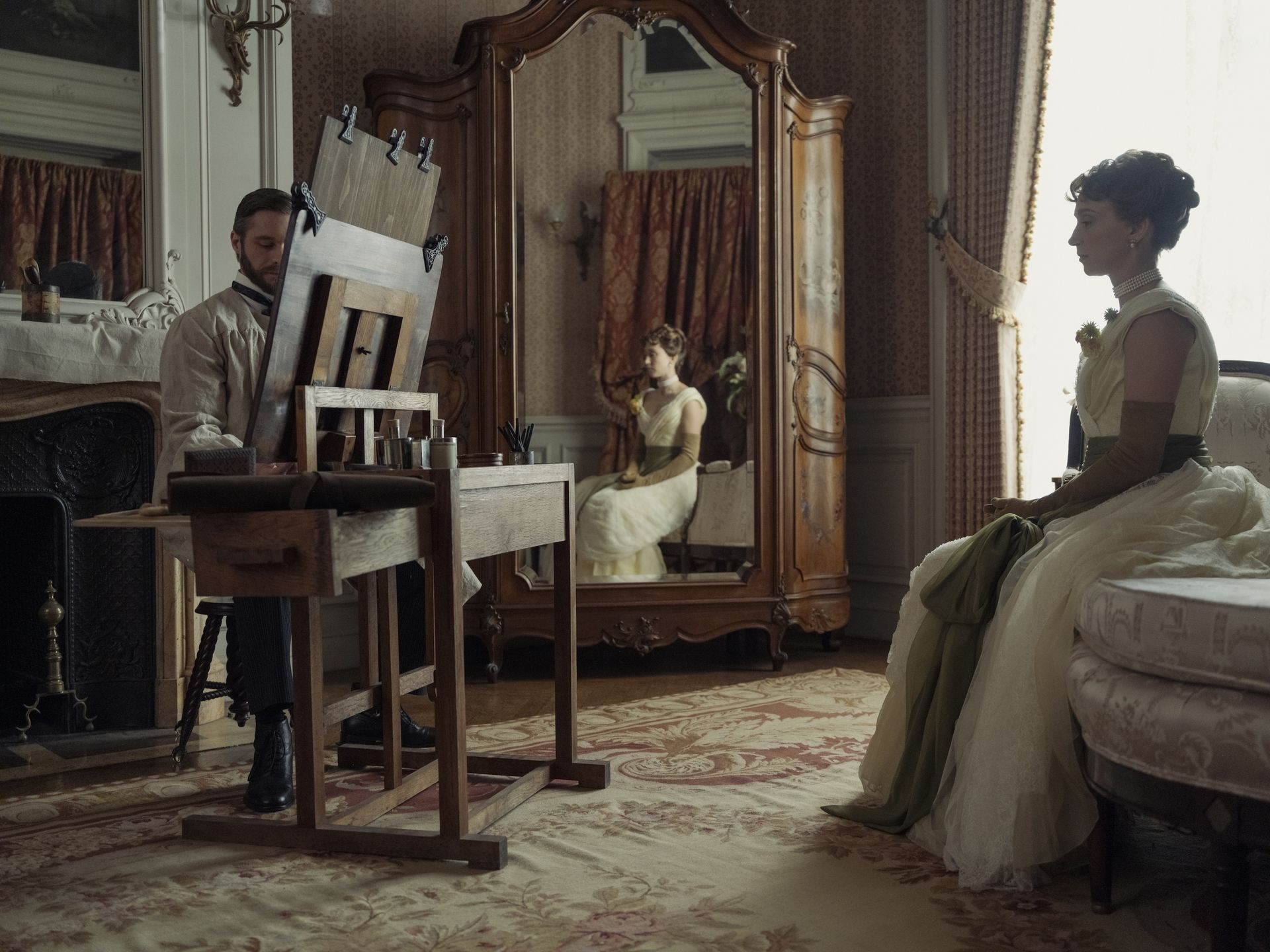 John Singer Sargent sits at an easel across from Gladys Russell