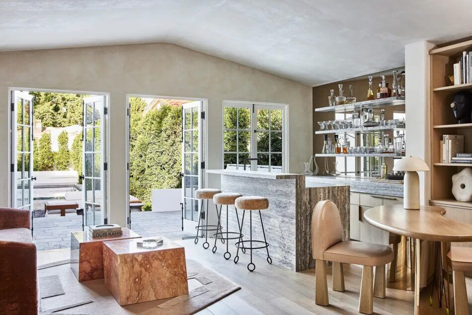 In a calming contemporary home for a family in Beverly Hills, she created a wife’s study that doubles as a home bar.