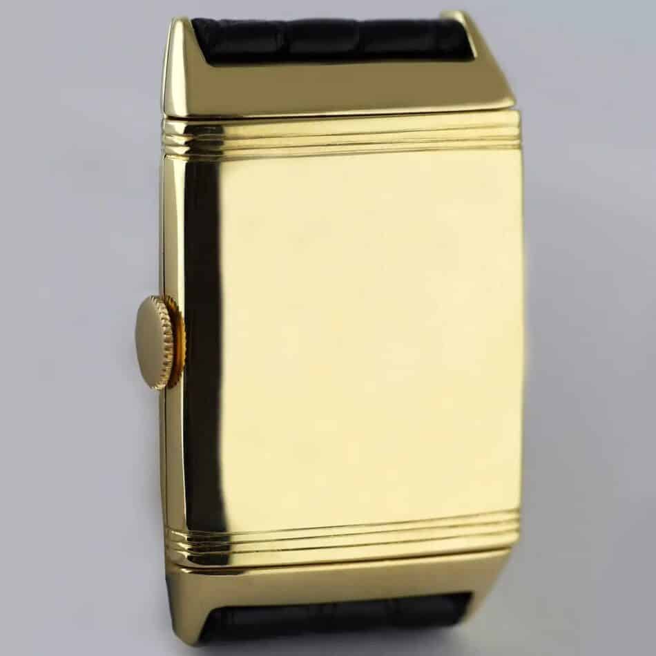 A gold Jaeger-LeCoultre Reverso with the case back facing forward