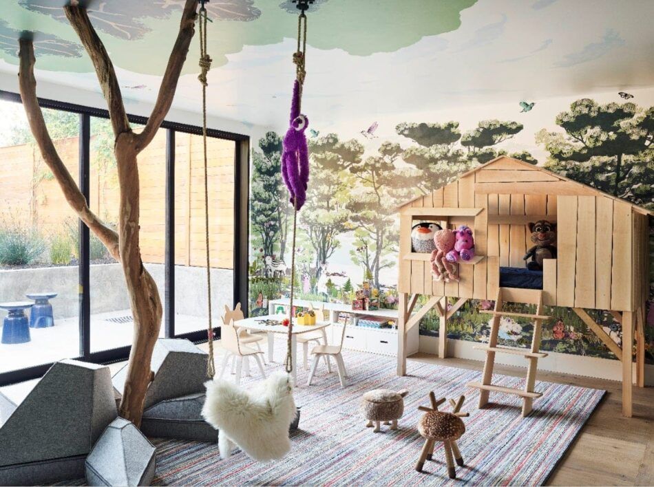 a childrens playroom with a lofted bed