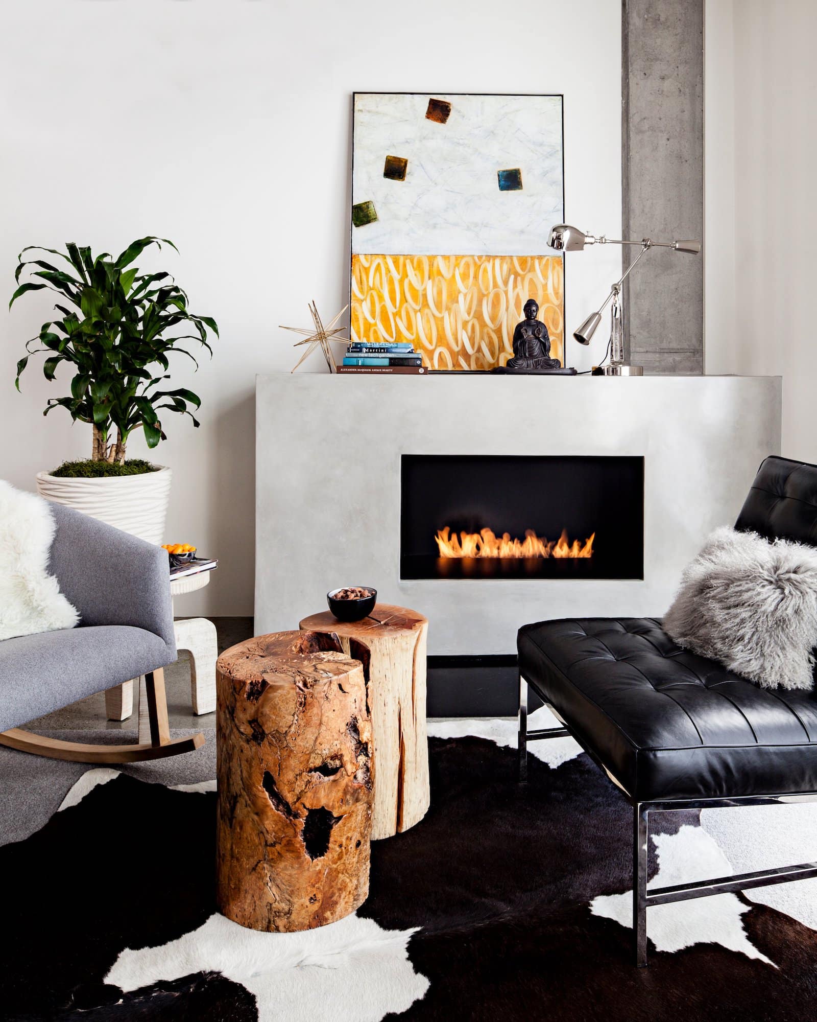 JHL Design added a warm fireplace to this loft in Portland, Oregon.